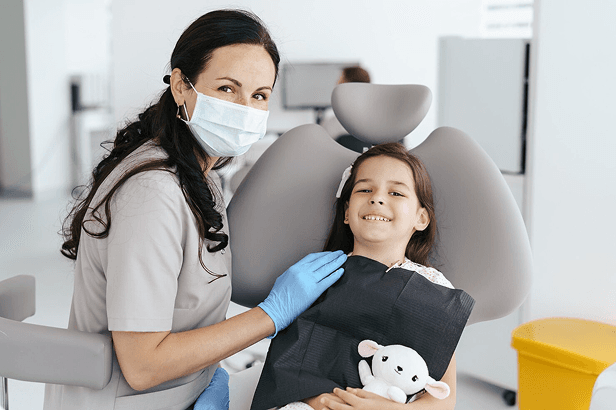 Dentist and young patient